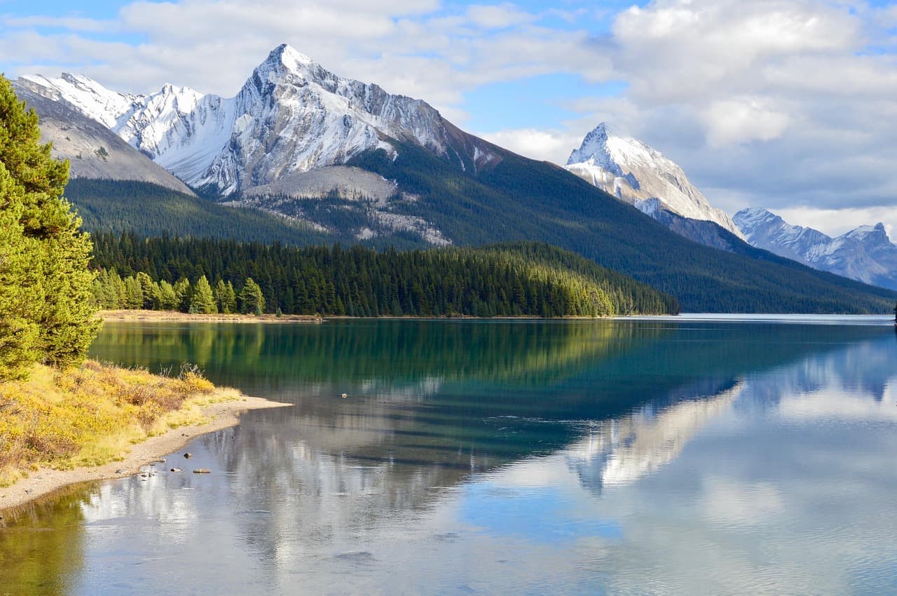 Wilderness camping in Jasper National Park surrounded by mountains and forests